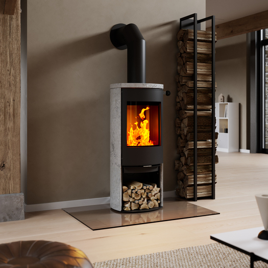 CARO 120 con rivestimento in pietra ollare Stufa a legna CARO 120 con porta in acciaio di colore nero e rivestimento in pietra ollare